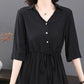 Women’s loose V neck mid-length shirt